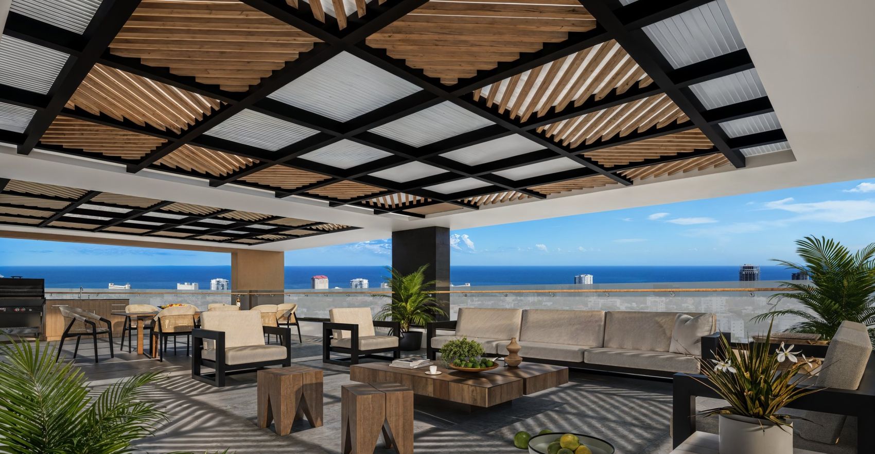 Terraza techada con pérgola de madera, juegos de sofás y vista abierta al mar